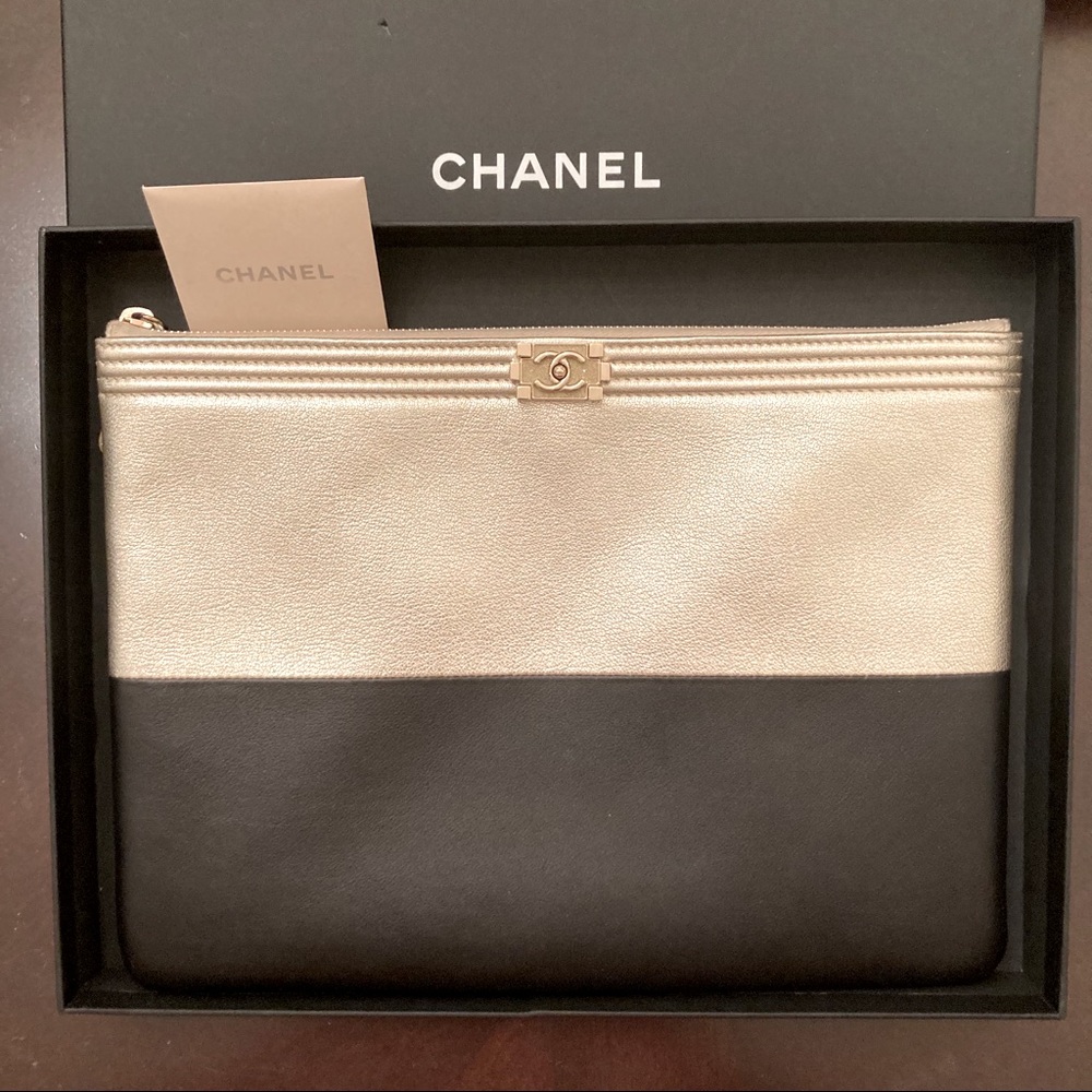 Chanel
Bicolor Boy O Case Clutch Metallic Goatskin and Calfskin Medium